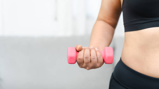 istock Young asian woman attractive exercises workout at home 1502425352