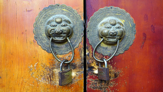 Ancient traditional door and knock in the temple and landmark