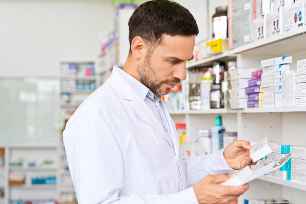istock Male pharmacist in pharmacy 1502426475