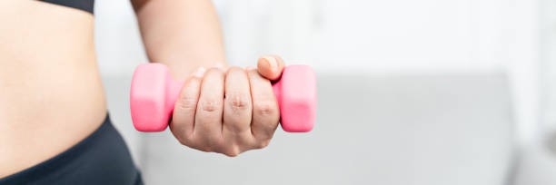 istock Young asian woman attractive exercises workout at home 1502429556