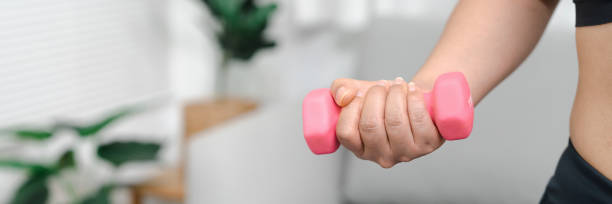 istock Young asian woman attractive exercises workout at home 1502429567