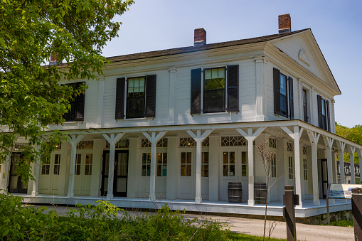 Penisula, Ohio, USA - May 18, 2023: Front of the Boston Mill Visitor Center store, once was a general store and Post Office and later a home before becoming a store again.  Built in 1825