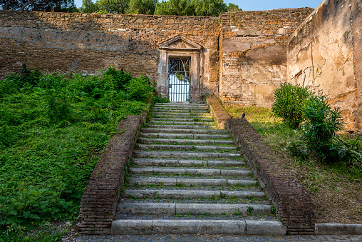Ancient stairs and wall at Rocca Savella Rome in the morning