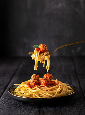 Food photography of meatball, spaghetti, pasta, fork