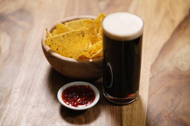 istock dark beer with nachos and salsa sauce 1502436218