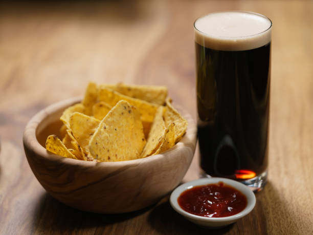 istock dark beer with nachos and salsa sauce 1502436336