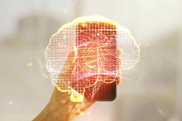 creative artificial intelligence concept with human brain hologram and hand with phone on background. multiexposure - nerve cell brain engineering cell imagens e fotografias de stock