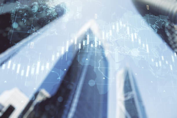 istock Double exposure of abstract financial graph with world map on office buildings background, financial and trading concept 1502441307