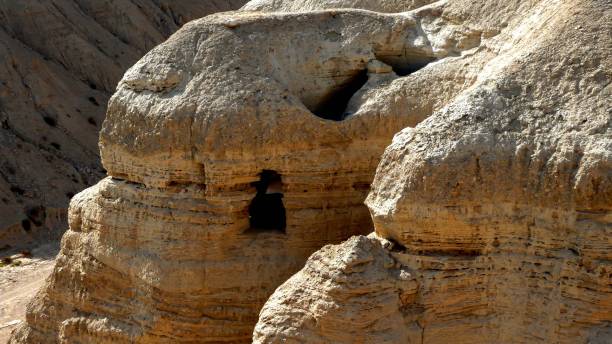 istock a cave with some rocks on top of it in the desert 1502450199