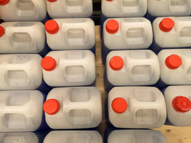 istock Selection of plastic containers sorted in a row with red caps. 1502455189