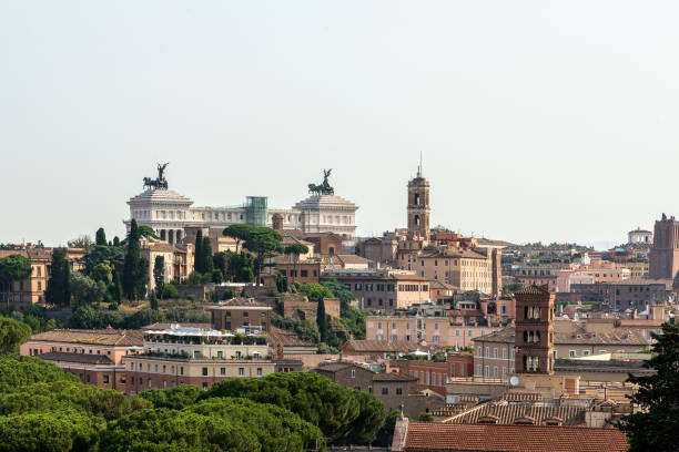 istock Panoramic view on Fatherland Rome, Italy with a pine trees 1502457286