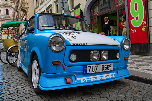 Prague, Czech Republic-August 21,2018:Close-up view of iconic Trabant  601 for rent. Vintage blue car.