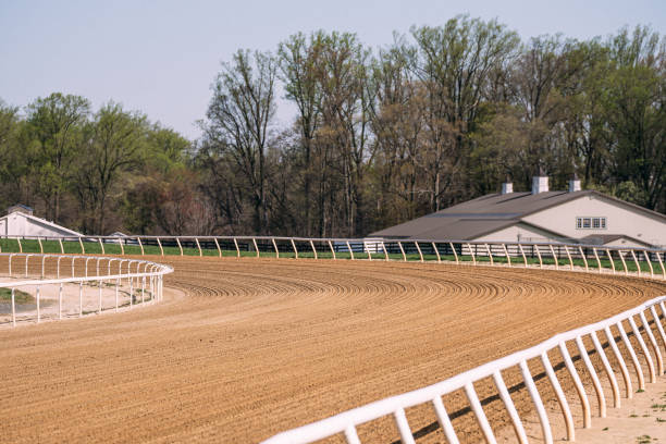 Freshly Tilled Dirt Horse Racing Track with White Railing