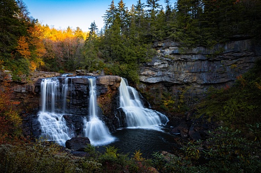 An awe-inspiring landscape featuring Blackwater Falls surrounded by lush vegetation. West Virginia.