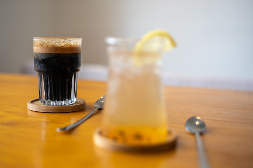 A glass of iced black coffee  - Refreshing caffeine drink