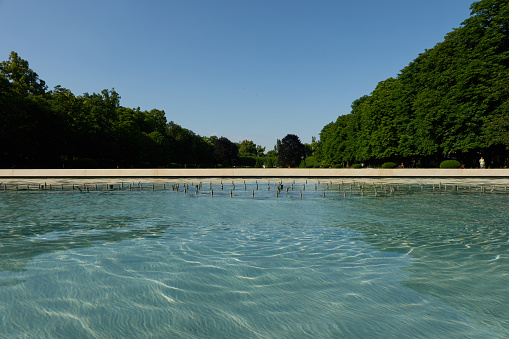 Podebrady, Czech Republic - June 12, 2023 - water fountain in the spa park on a sunny spring afternoon.  The newly landscaped park on T. G. Masaryk Square, dominated by a fountain that forms the characteristic sign of the town in regular rhythms.