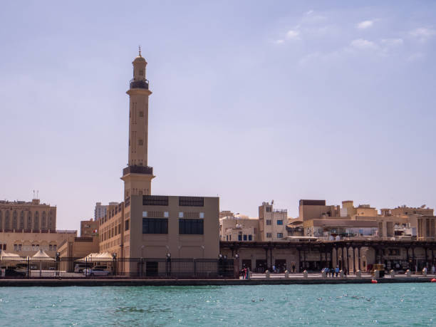 istock Dubai Museum in foreground with Juma Grand Mosque. 1502497363