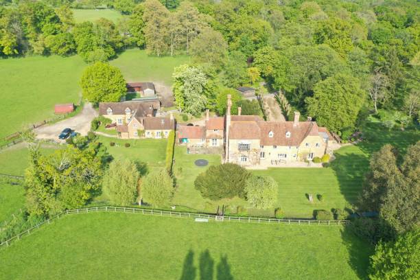 Drone perspective over green fields of Hook, Hampshire, England
