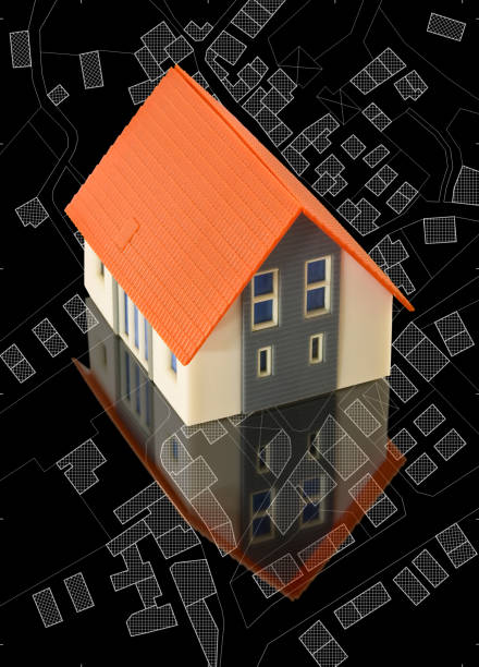 istock Cadastral map with buildings, free land parcel for house construction - building activity and permit concept with home model 1502530082