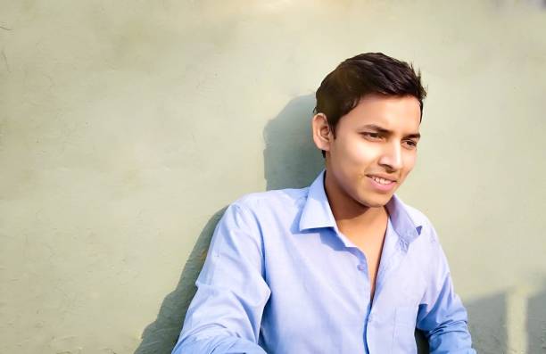 Portrait Of Confident Young Man Smiling
