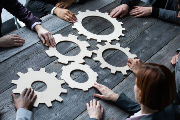 istock People with cogs of business 1502531820