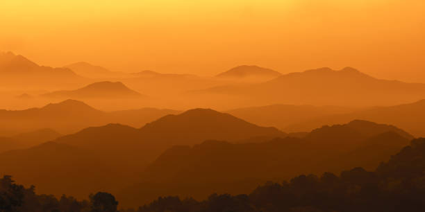 Free Stock Photo of Golden sunrise over misty valleys with distant ...