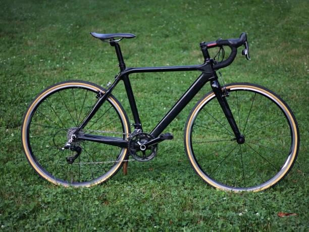 istock carbon cyclo cross bike on grass background (skin wall tires, cycling, biking) 1502533899