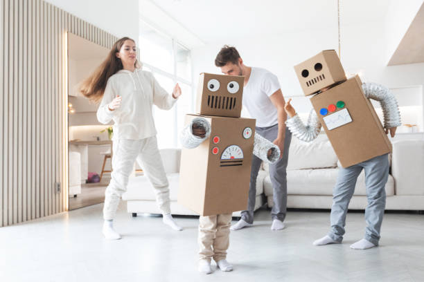 istock Family playing robots at home 1502534115