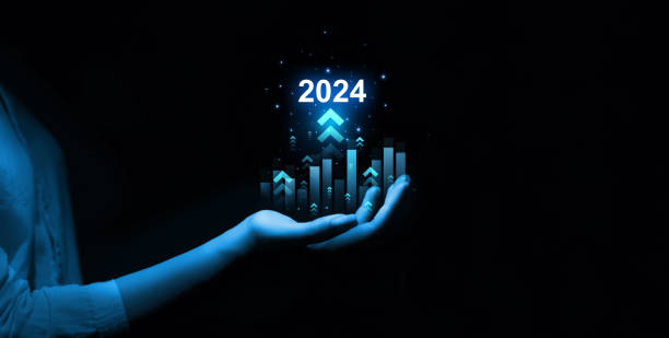 istock Businessman draws increase arrow graph corporate future growth year 2024. Planning,opportunity, challenge and business strategy. New Goals, Plans and Visions for Next Year 2024 1502536242