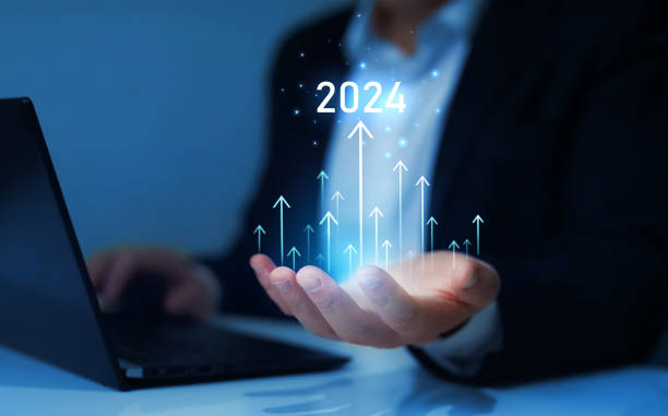 istock Businessman draws increase arrow graph corporate future growth year 2024. Planning,opportunity, challenge and business strategy. New Goals, Plans and Visions for Next Year 2024 1502536248