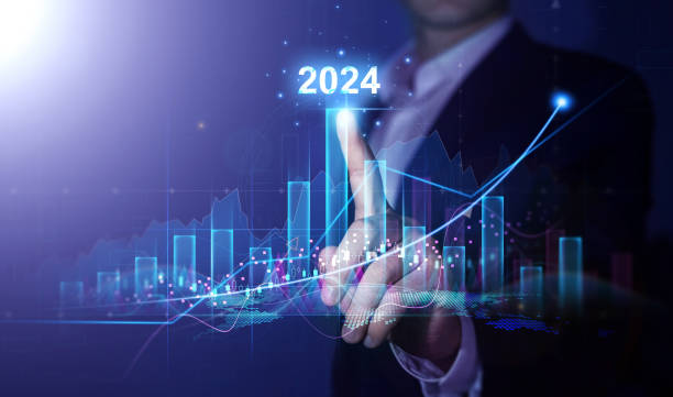 istock Businessman draws increase arrow graph corporate future growth year 2024. Planning,opportunity, challenge and business strategy. New Goals, Plans and Visions for Next Year 2024 1502536249