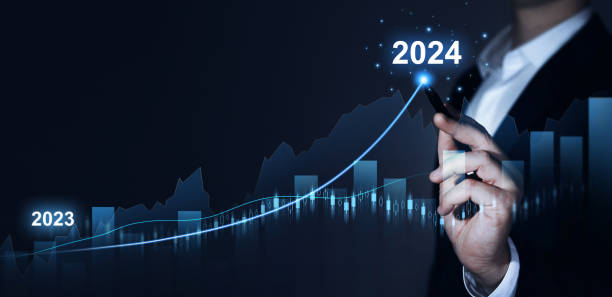 istock Businessman draws increase arrow graph corporate future growth year 2024. Planning,opportunity, challenge and business strategy. New Goals, Plans and Visions for Next Year 2024 1502536264