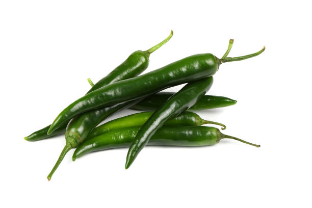 istock Green chili pepper isolated on white. High resolution photo. 1502541673