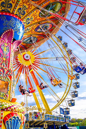 Falmouth, Massachusetts, USA-July 26, 2019-   Food trucks, games of chance and carnival  rides attract people of all ages to  the Barnstable County Fair held each summer at the fairgrounds in Falmouth, Massachusetts.
