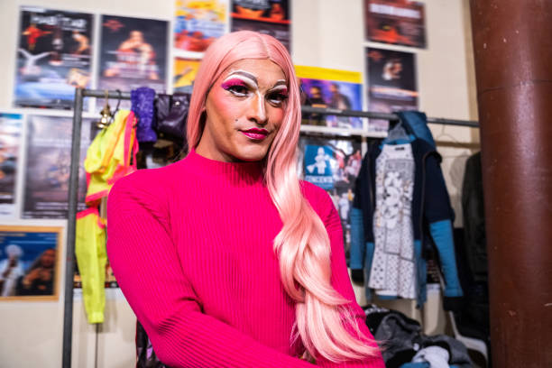 Portrait of a drag queen behin backstage at theater Portrait of a drag queen behin backstage at theater crossdressing clothes stock pictures, royalty-free photos & images