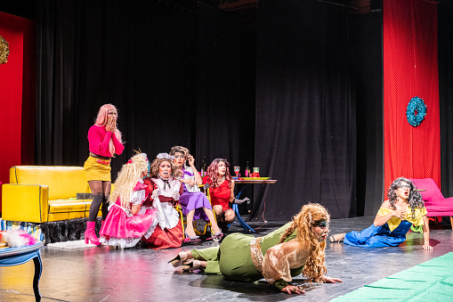 Drag queens performing in a theater play