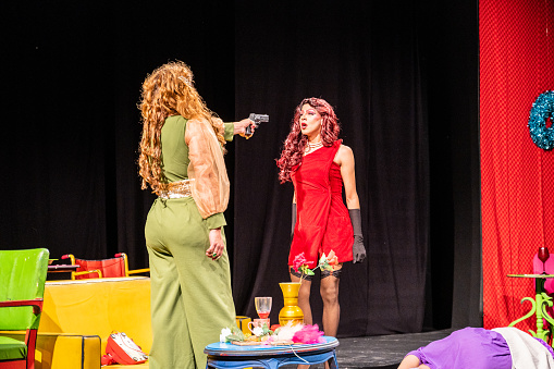 Drag queens performing in a theater play