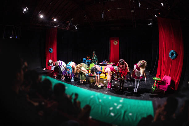 istock Group of drag queens bow to audience after performance 1502557212