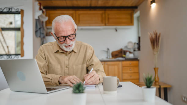 istock One senior caucasian man work on laptop use computer at home 1502558480