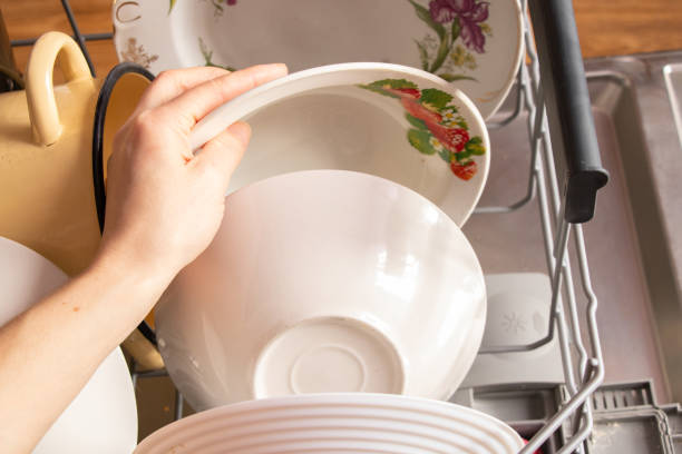 istock dirty dishes are in the dishwasher container 1502558813