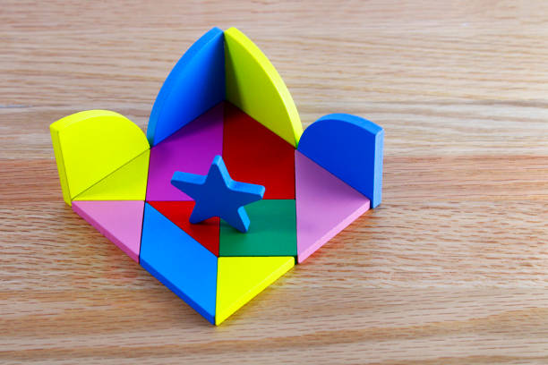 istock Puzzle with wooden figures of different colors 1502561145