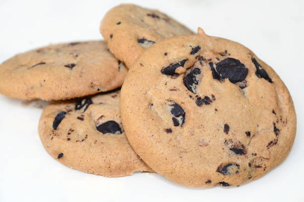 istock white cookies with chocolate drops lie on the table 1502562217