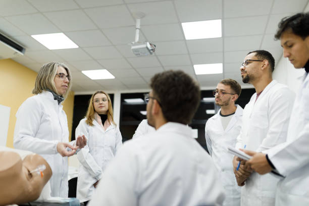 istock Professor and medical students during a practical gynecology class 1502562840