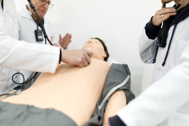 istock Medical students using stethoscope to listen to heartbeats on practical class 1502562994