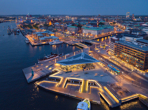 Aerial view of downtown Gothenburg at night. In the foreground is Stenpiren, a hub for public transportation (trams, buses, boats).