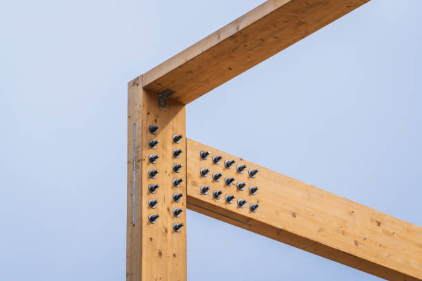 Construction of new wooden house. Beams frame close up