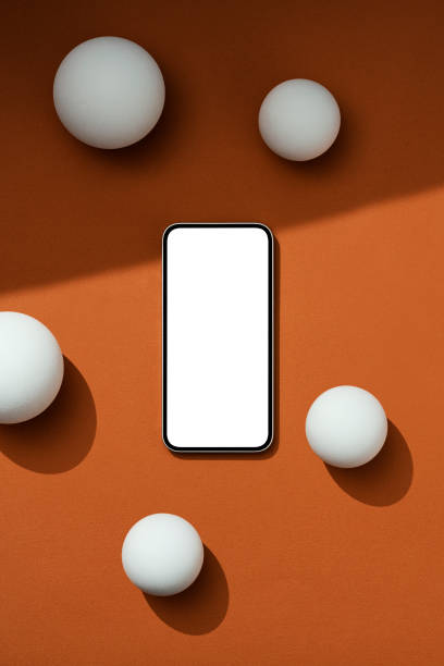 istock Blank white screen smartphone mockup on brown background 1502565767