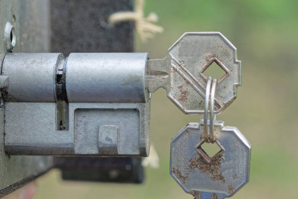 Keys forgotten on metal bench outdoors. Lost and found
