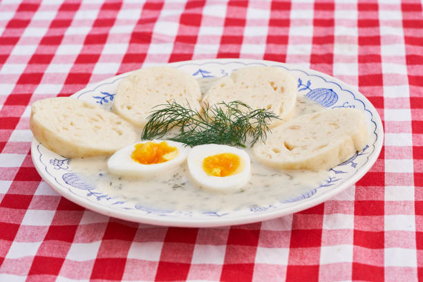 Creamy dill sauce with czech dumplings and soft boiled egg
