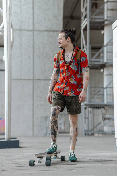 istock Adventures on Wheels: Young Man Explores the City on his Longboard 1502600019